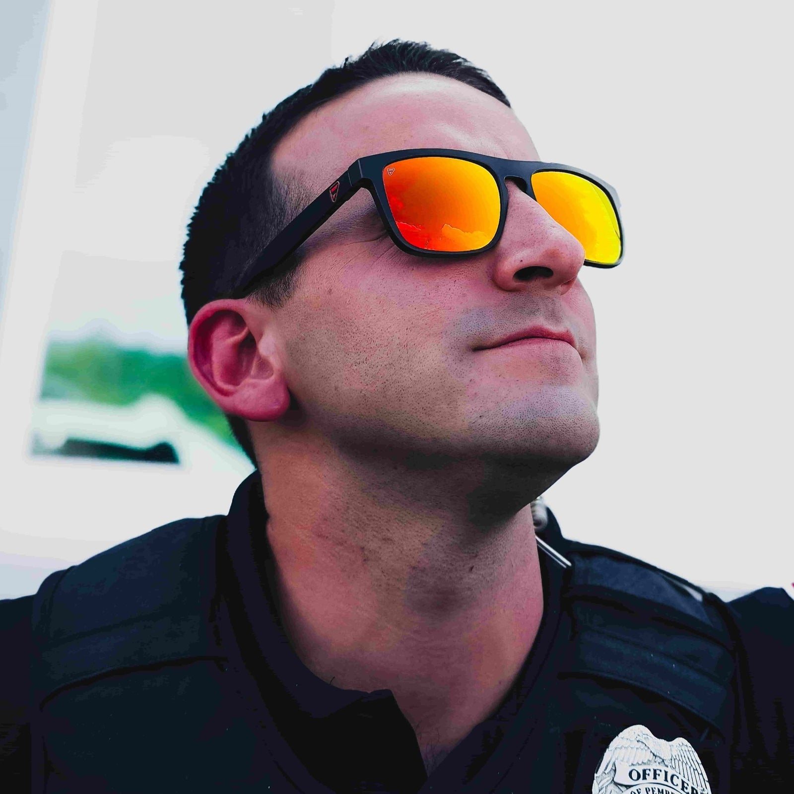 Police officer wearing Frontline Optics Pomona Crimson sunglasses