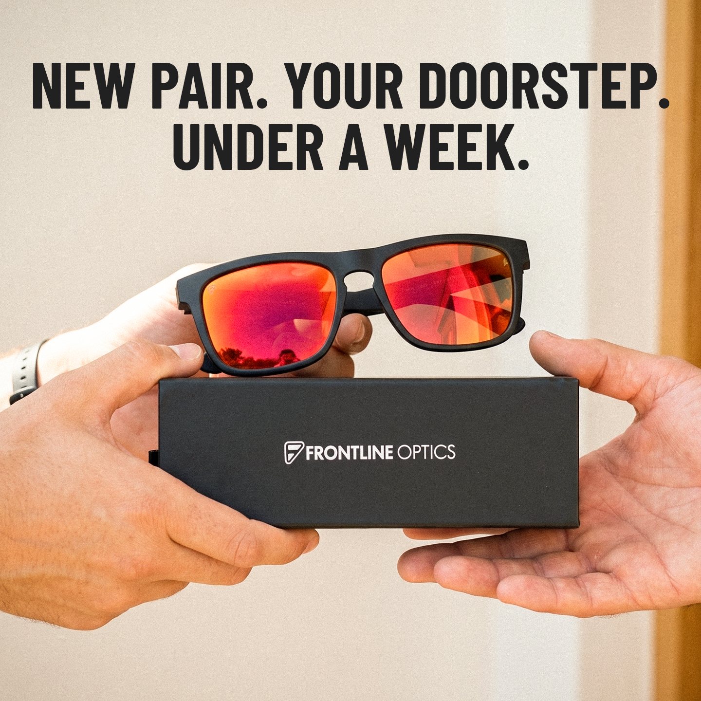 Hands holding a new pair of Frontline Optics sunglasses on their case